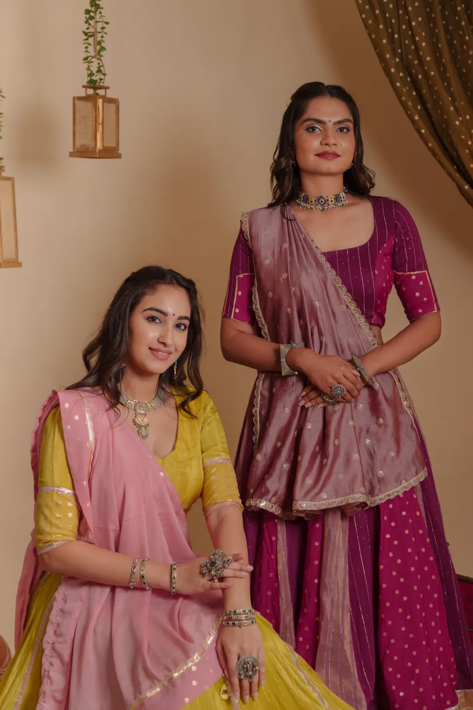 Two women in chaniya cholis from the Rang Raas collection by Nirali Amin, Vadodara
