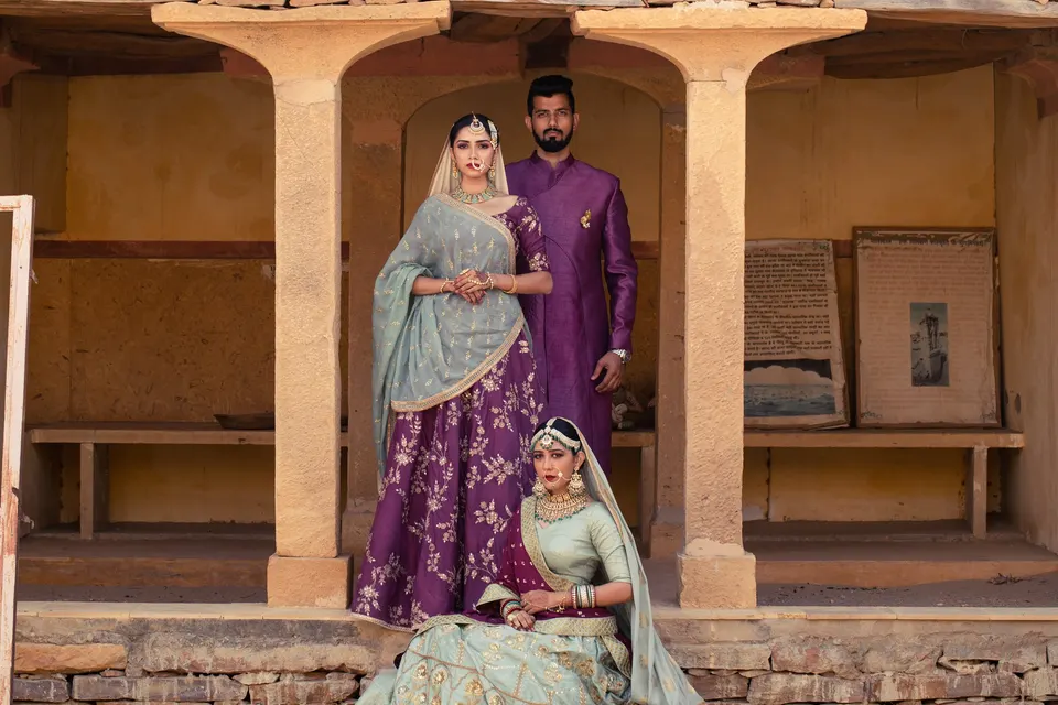 Couples by Nirali Amin — lehengas and sherwanis, together, photograph 4